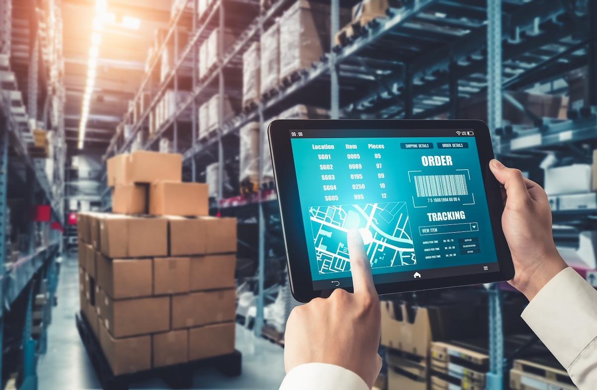 Order tracking screen on a tablet inside a warehouse, showcasing the real-time tracking technology used by Del Bravo