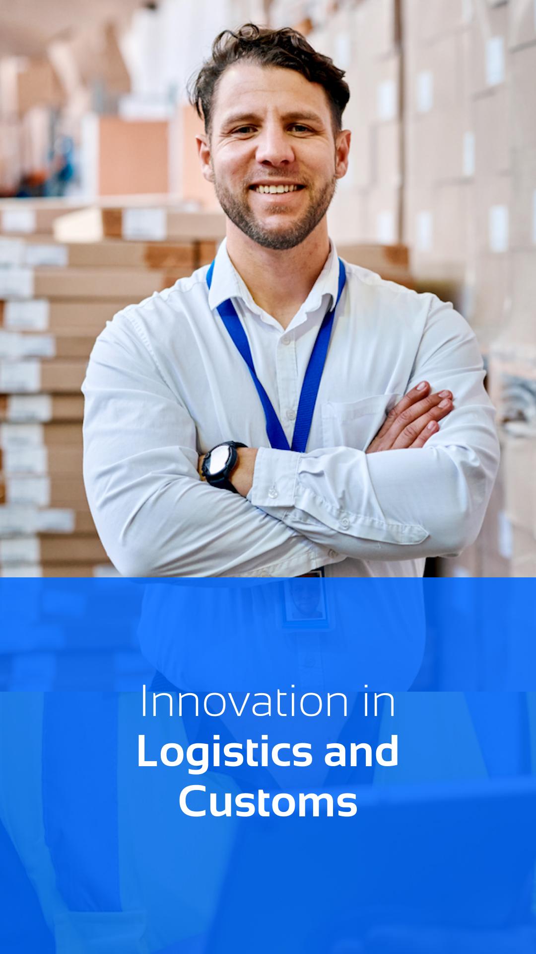 Smiling professional in a warehouse setting, reflecting Del Bravo's commitment to innovation in logistics and customs, ensuring efficient and reliable services