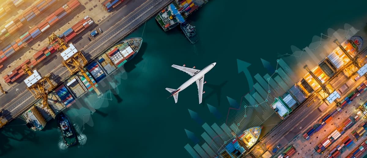 Aerial view of a port with a plane flying overhead, showcasing Del Bravo's ability to connect international trade through multiple modes of transportation